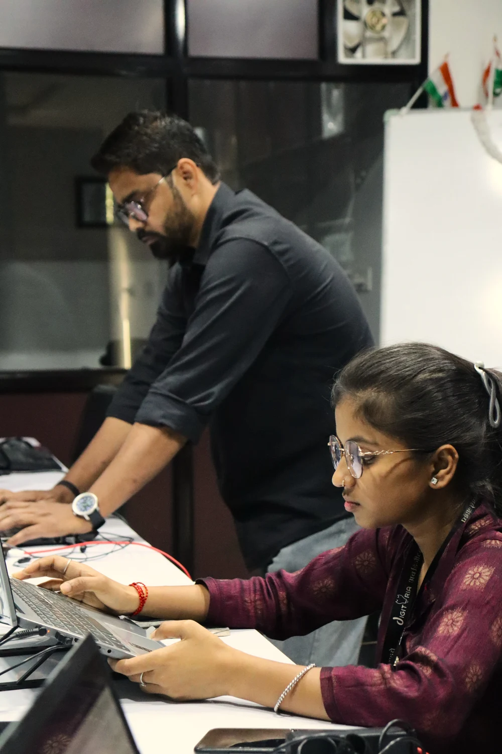 The team collaborating on a laptop