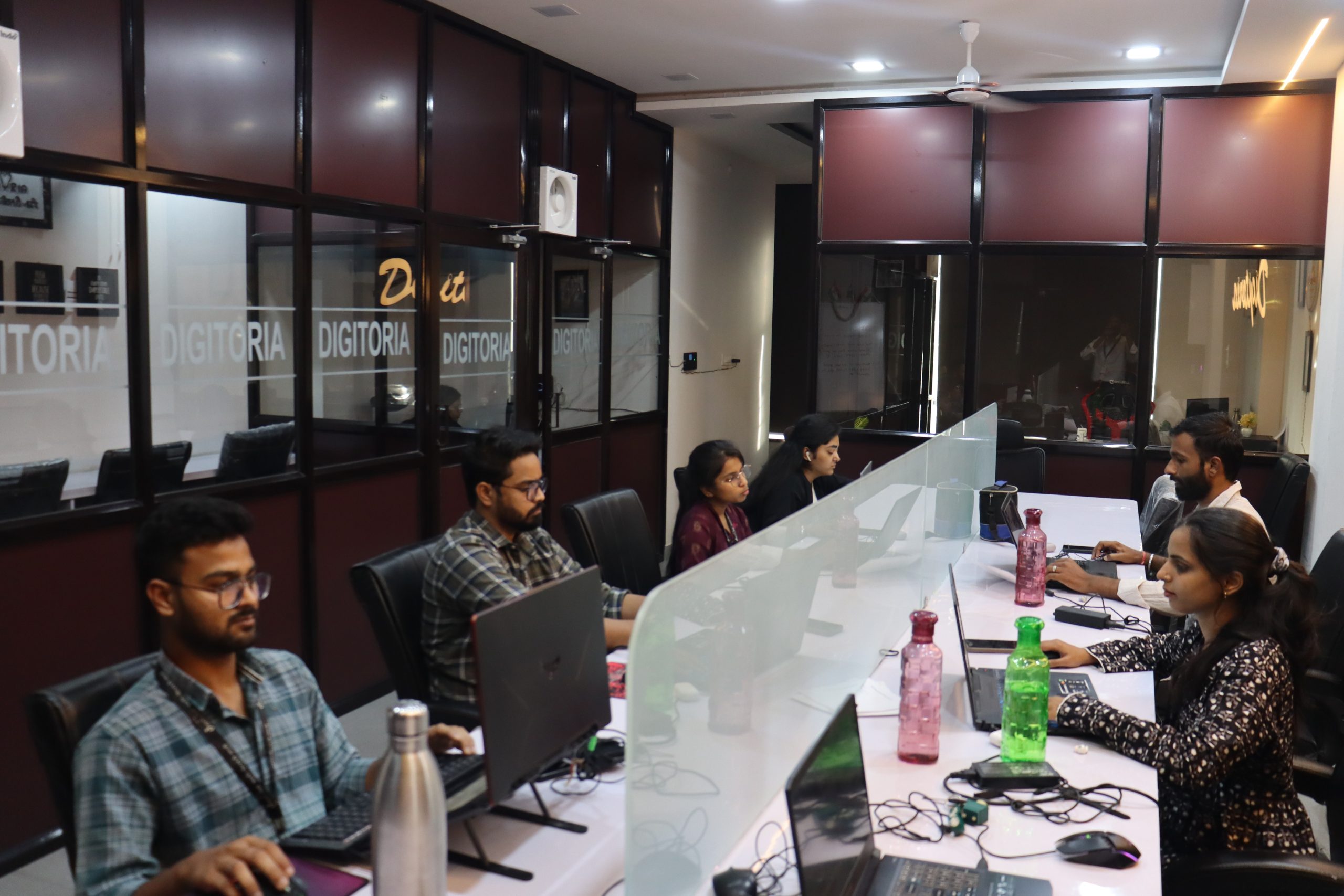 Digitoria team working on digital marketing campaigns